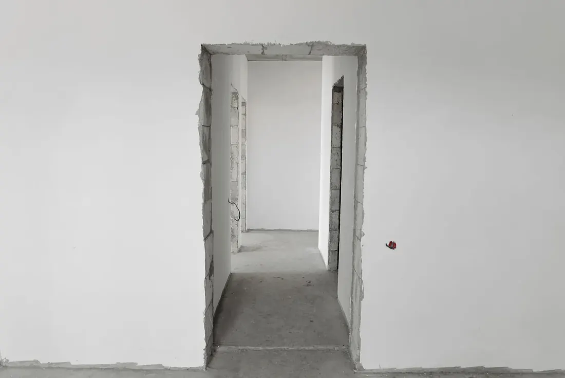 Newly finished interior doorway before the final construction clean
